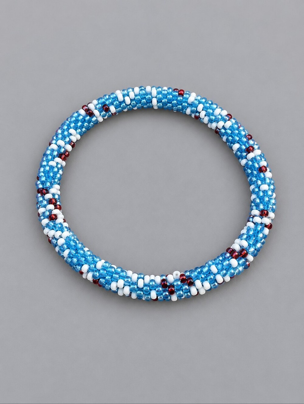 3/$30 Blue Beaded Tubular Roll On Bracelet
